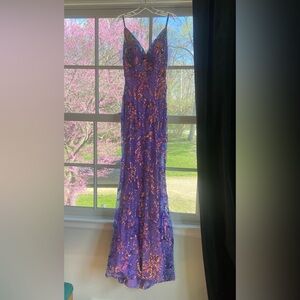 Beautiful, shimmery prom dress. New without tags. Never worn or altered.